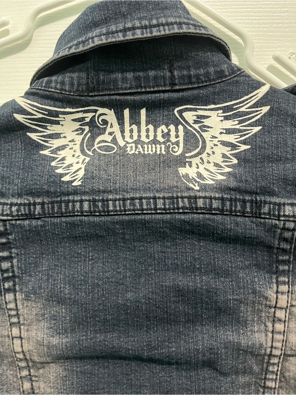 Abbey Dawn Dark Blue Denim Jacket with White Wing Graphic
